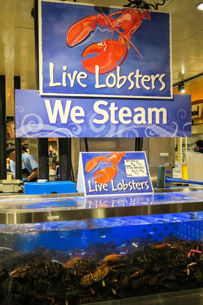 Live Lobster Tank, Seafood Section, Wegmans Grocery Store, Westwood, Massachusetts, USA. Image shot 2016. Exact date unknown.